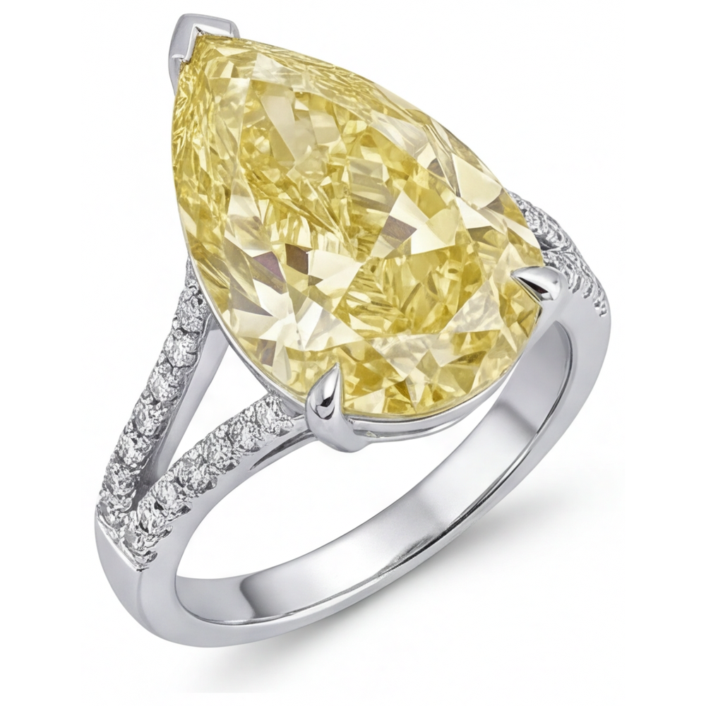 Pear Cut Canary Yellow Diamond ring in 14K White Gold – angle view