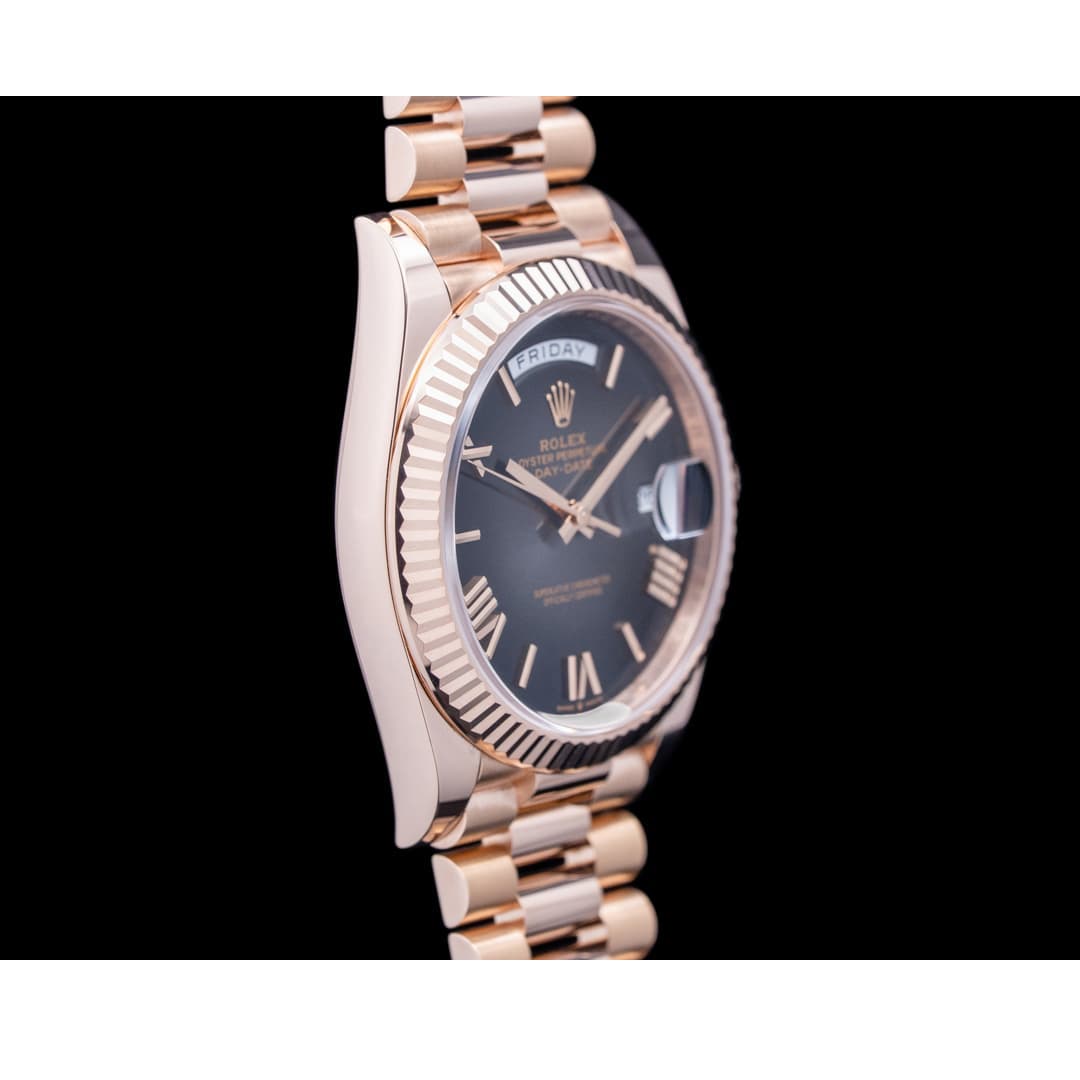 Rolex Day Date 228235 40mm Black Roman Dial Rose Gold Watch